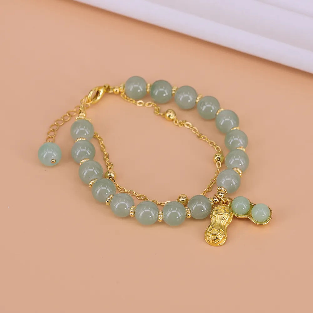 Hetien Jade Armband mit Goldakzent